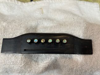 ebony bridge pins   slotted brass ring with Paua