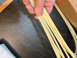 ivory colored binding   1/16 thick   .230  high  60 in  long