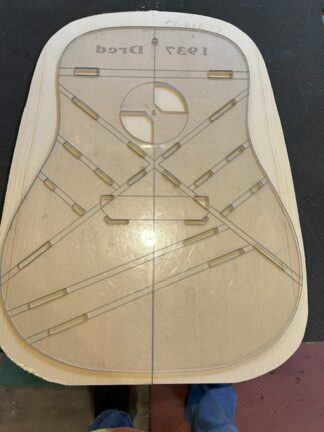 AAA Adirondack red spruce top. Stiff and even color