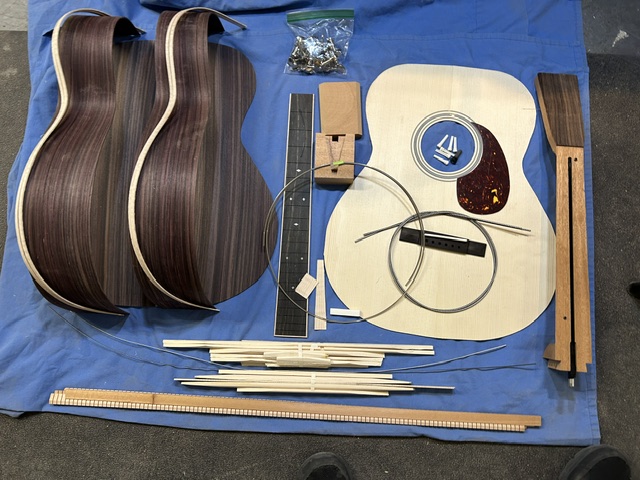 OM 28 with red spruce top maple binding