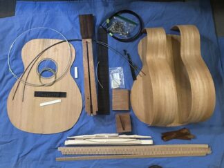0-17 All Mahogany guitar kit. Styled after a pre war . 1 3/4 nut 24.9 scale herringbone rosette and purfling